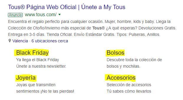 4 extensiones de sitio en un anuncio de Google Ads